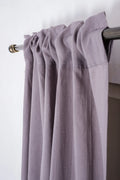 Purple linen curtain fabric texture close-up